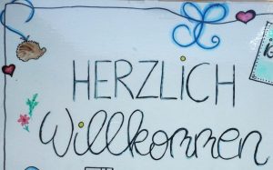 Herzlich-Willkommen-Schild